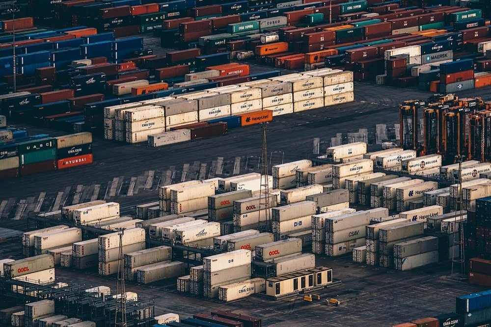 Shipping containers being loaded at a port